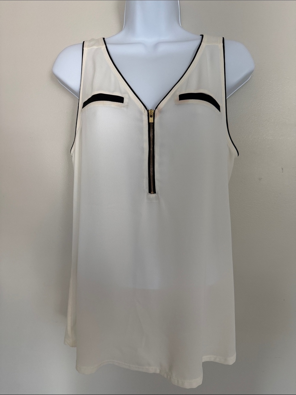 Express Cream Sleeveless Tank with Black Trim and Gold Zip